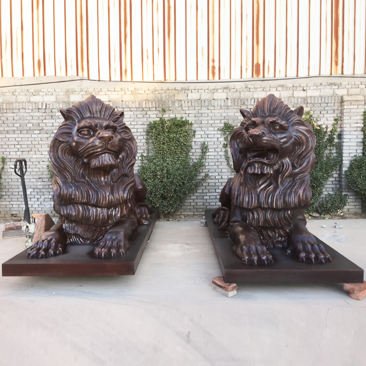 Cast bronze lions for garden decoration