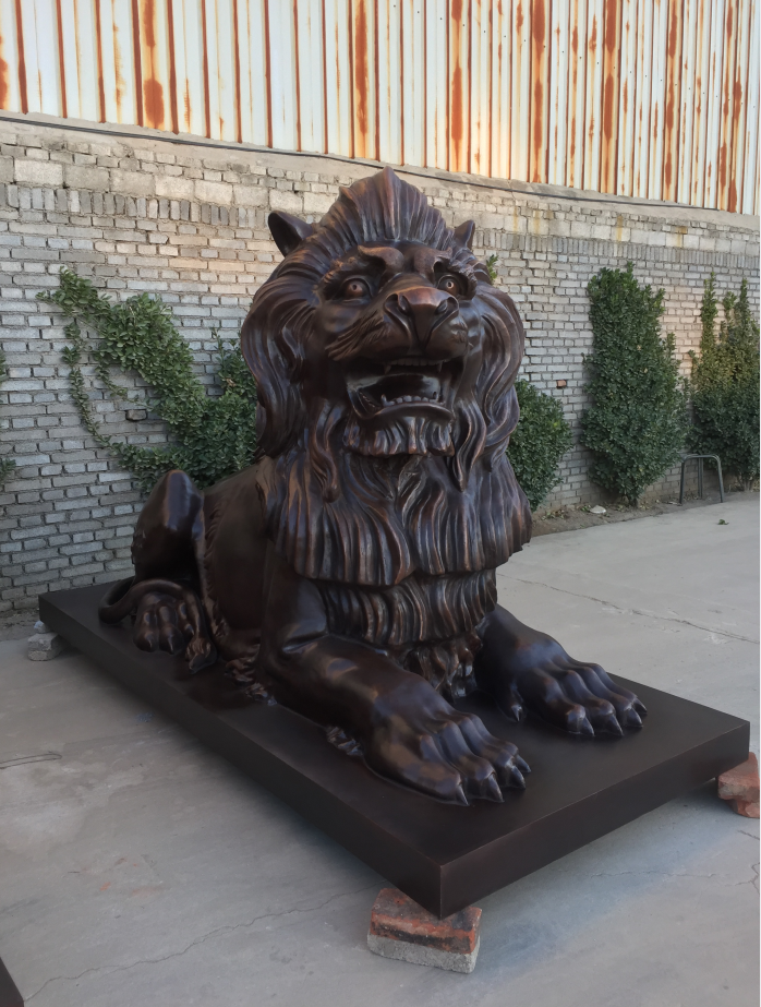 Cast bronze lions for garden decoration