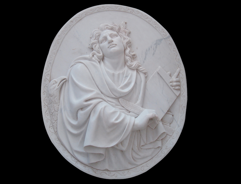 Hand carved rounded relief for outdoors decoration