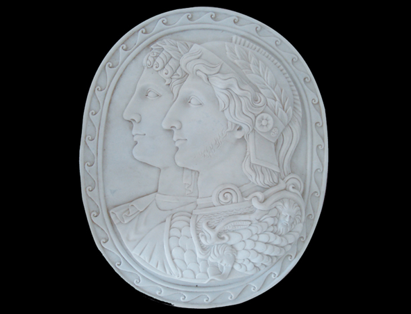 Hand carved rounded relief for outdoors decoration