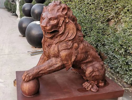 Cast bronze lions for garden decoration